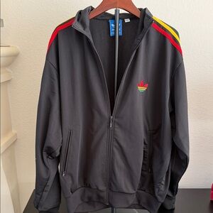 Adidas Black Track Suit with Red, Yellow, and Green Stripes and Matching Pants